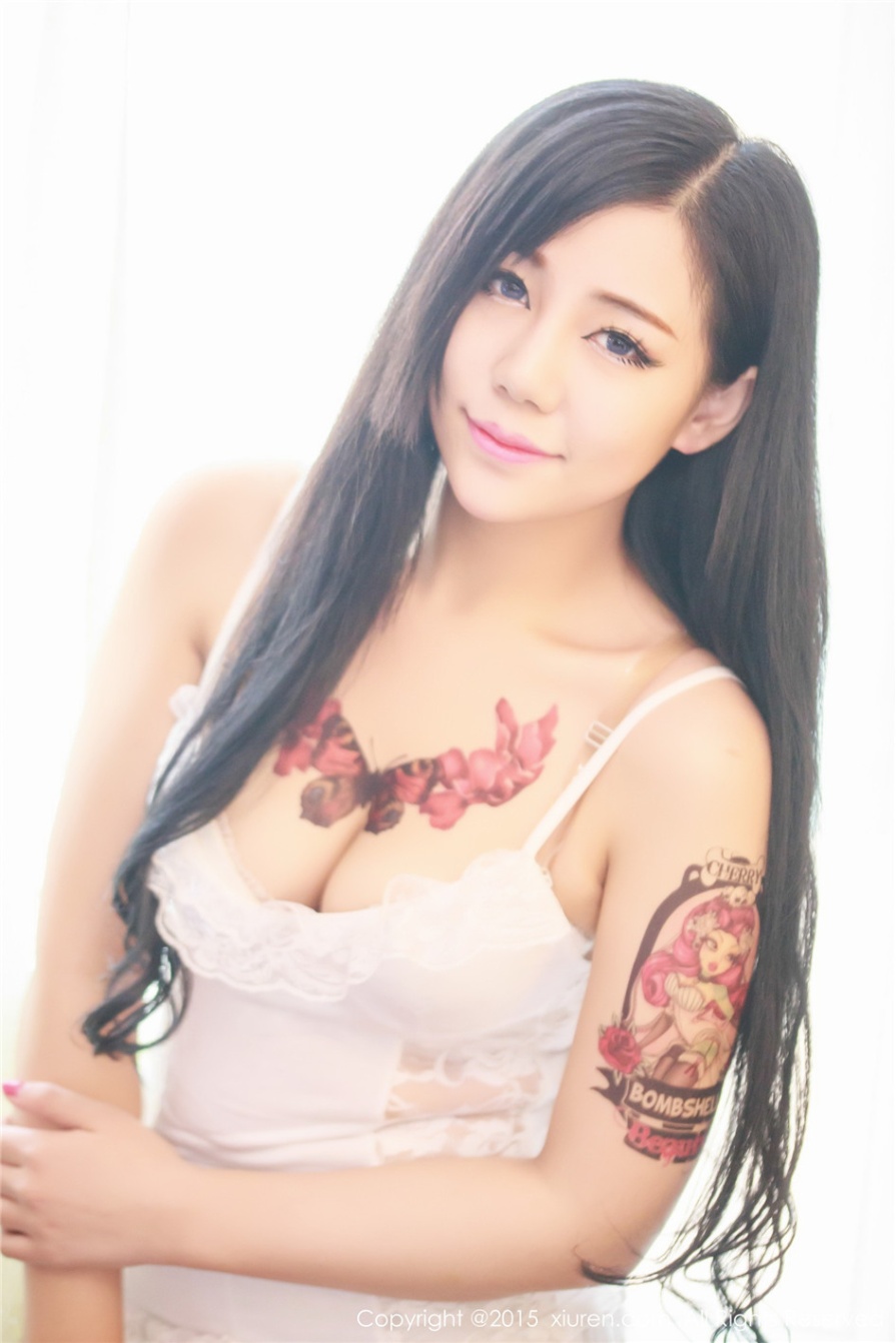 纹身美女模特旭旭床上性感乳沟诱惑写真图片(第37页)